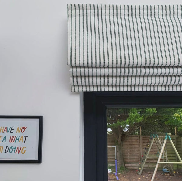 Corded Roman Shades: Traditional, stylish fabric shades with smooth pull-cord operation